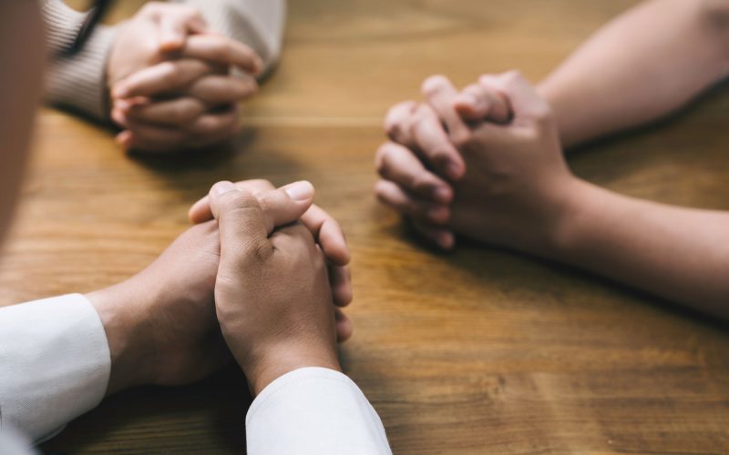 Hands folded in prayer